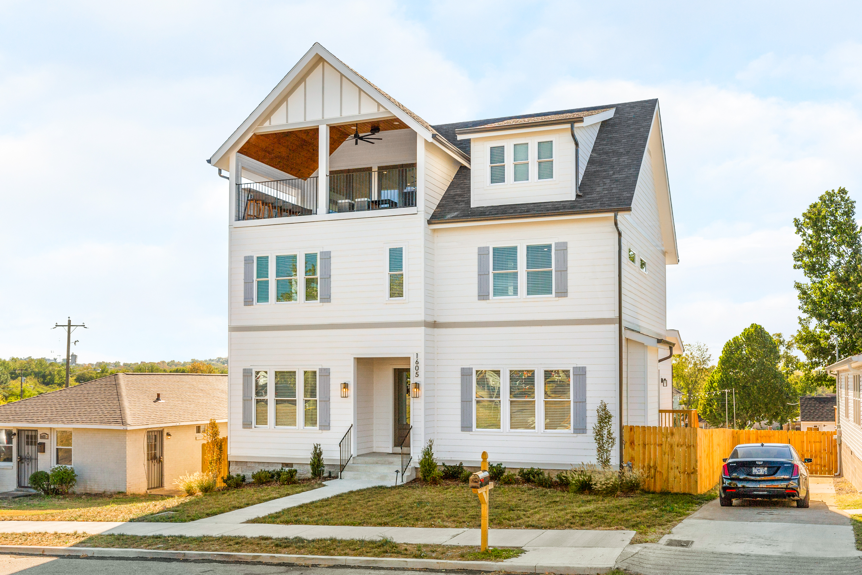 Three-story vacation rental with a covered top-floor balcony